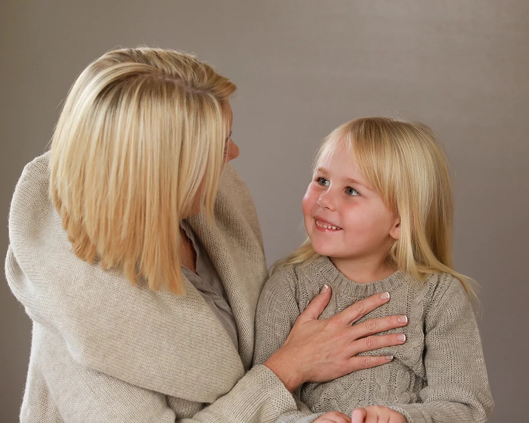 Annica Larsdotter with a child patient at Evolve Chiropractic Cygnet
